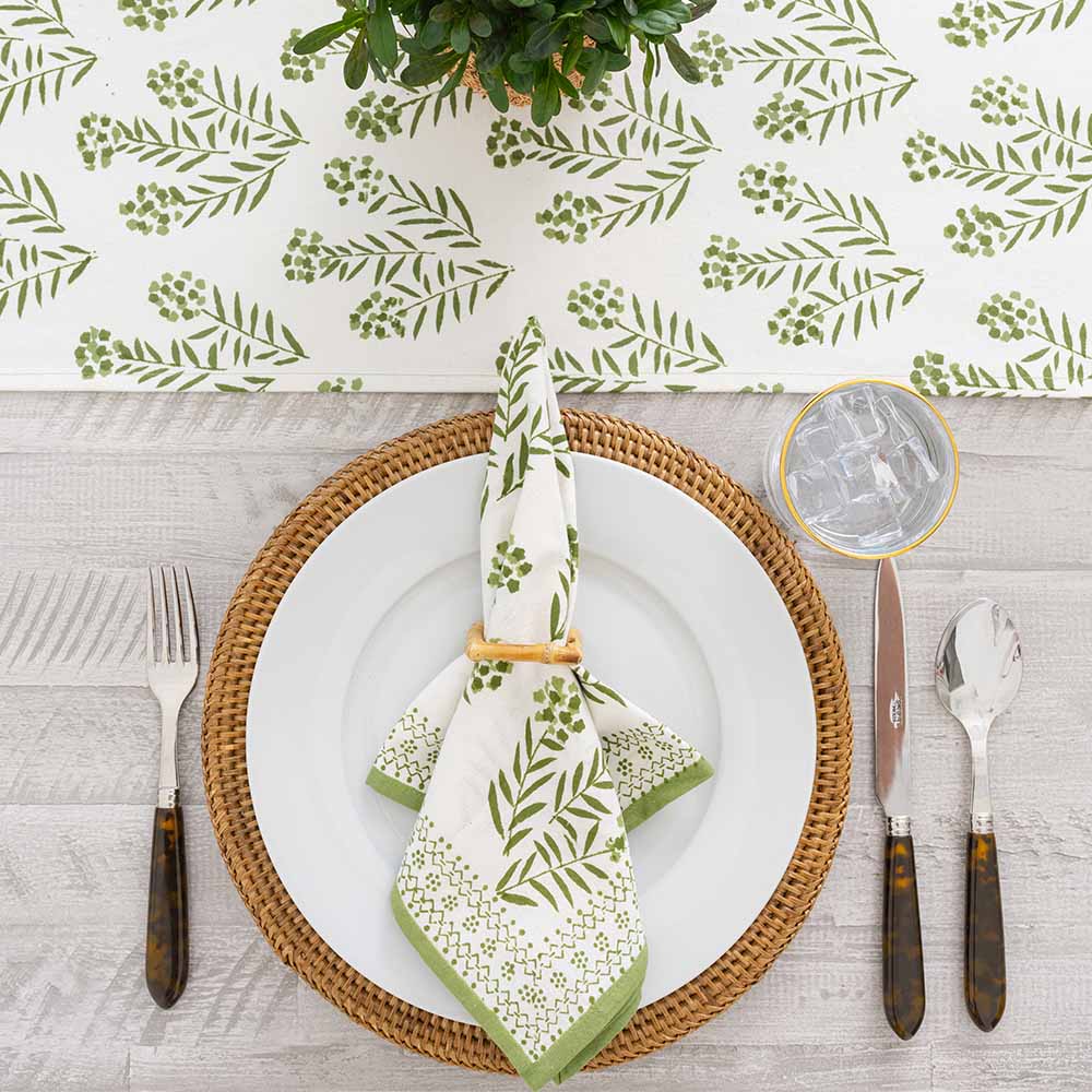 Overhead shot of napkin and matching table runner. 