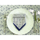 India Hicks Home Sea Ferns & Domino Midnight Napkin on white plate