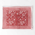 Close up of Pomegranate Poppy Placemat showing red and white detailing. 