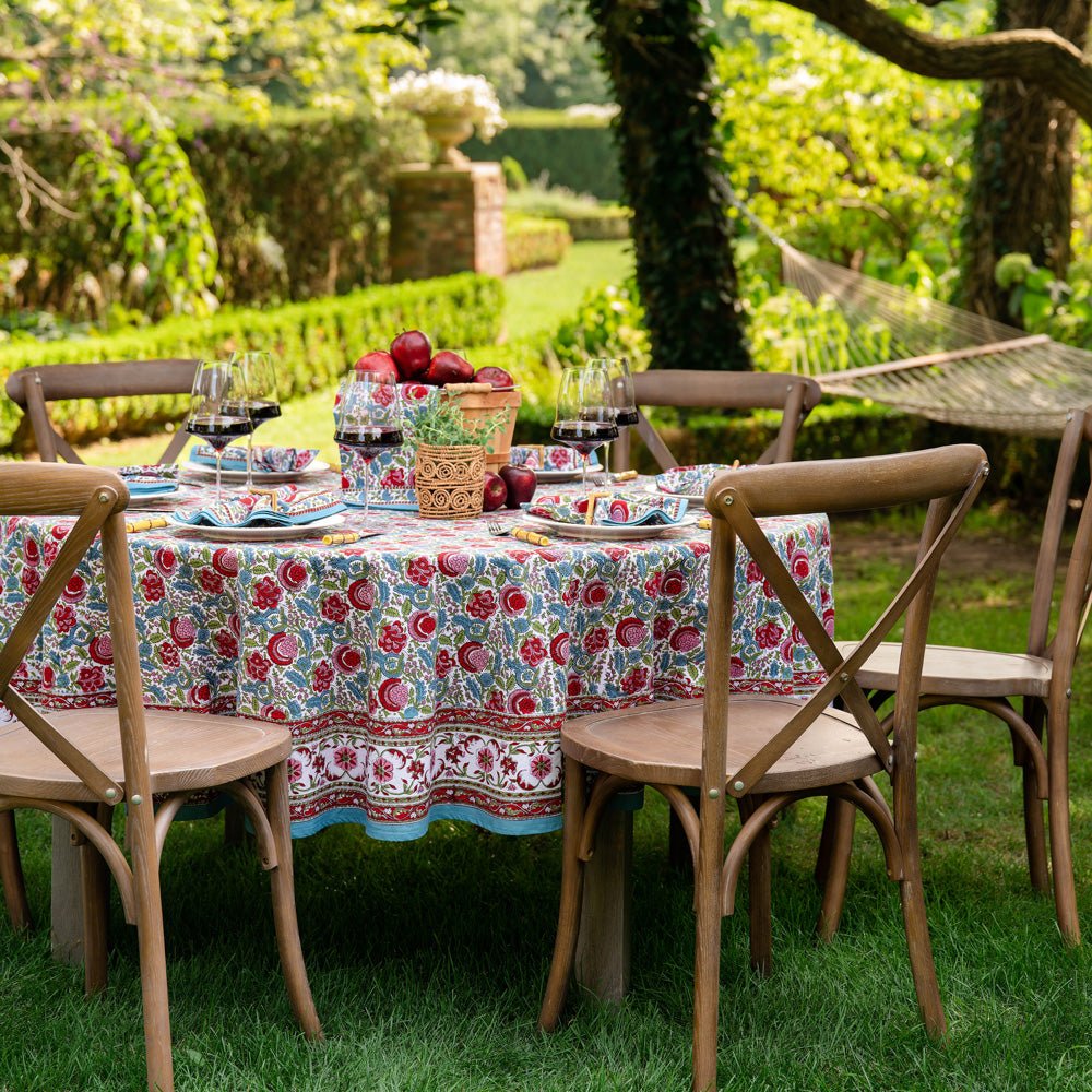 bohemian floral tablecloth on round table outside