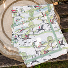 Napkin with equestrian Hunt Scene print and green ribbon