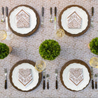 Tapestry dark chocolate brown and white napkins on white plates and matching tablecloth