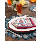 Bukhara Stripe Brick & Teal Napkin with starburst placemat