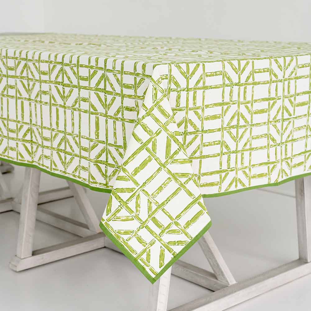 Tablecloth with green and white geometric bamboo pattern. 