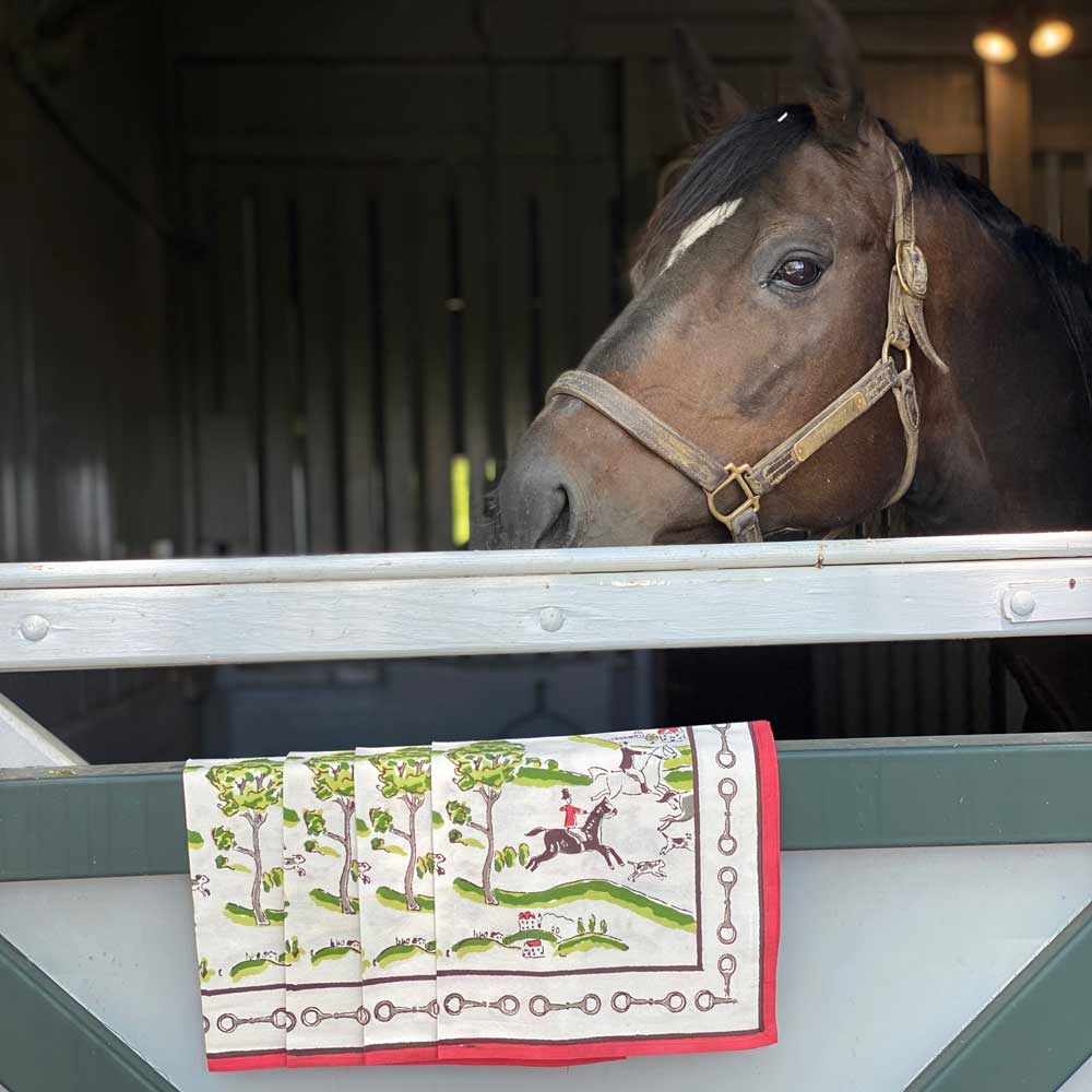 Hunt Scene Napkin hanging on stable with horse in background