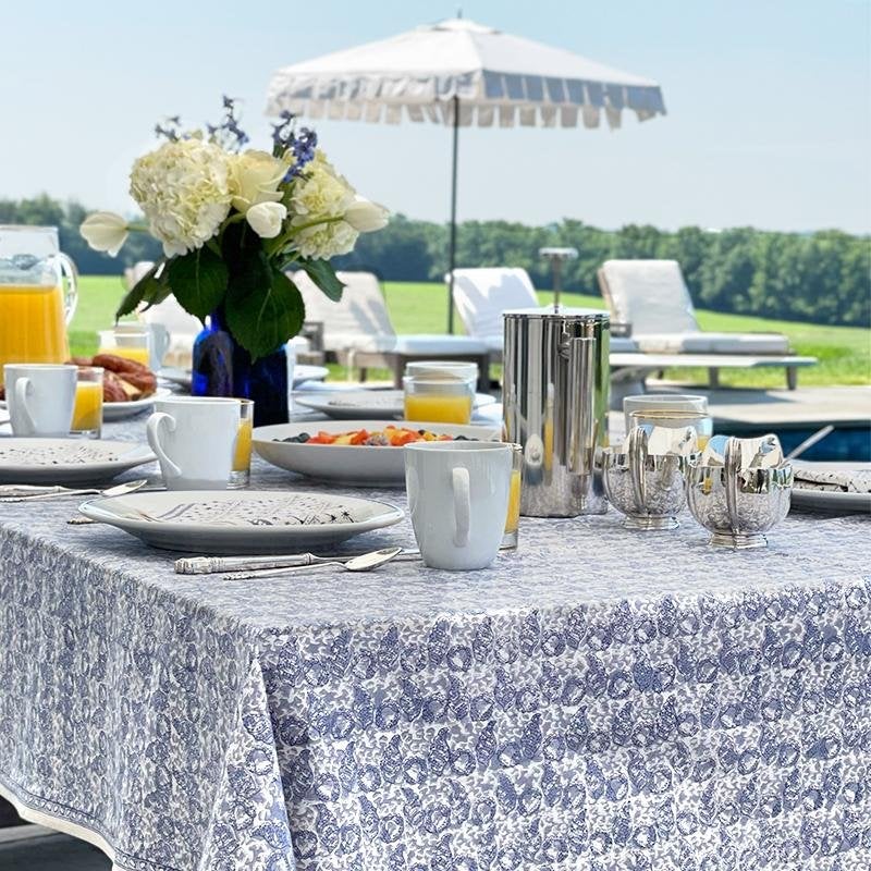 India Hicks Home Pochette Slate Tablecloth on breakfast table with coffee and tea