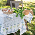 Outdoor table with eggs in a basket. 